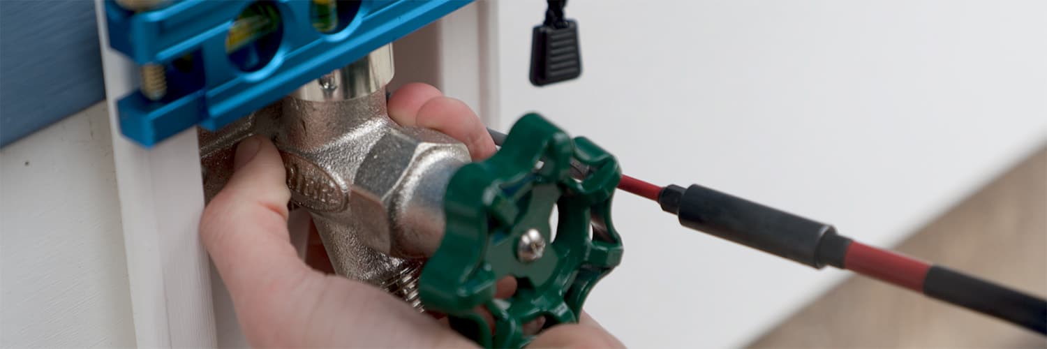 Water treatment equipment and plumbing lines in a utility room